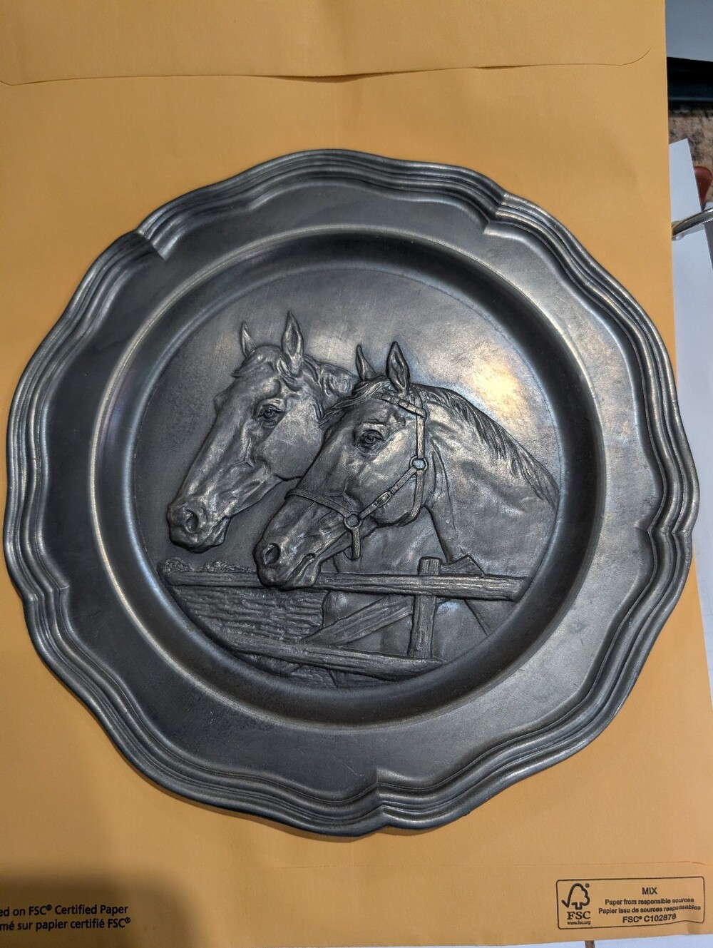 VIntage pewter wall plate.